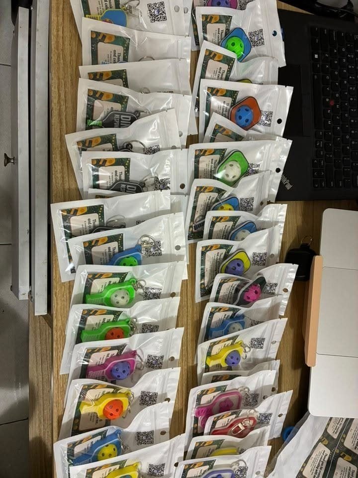 A batch of individually packaged sports-event giveaways